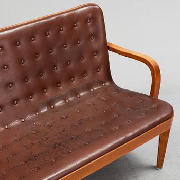 An Axel Larsson stained beech leather upholstered sofa, Svenska Möbelfabrikerna Bodafors, 1930's.