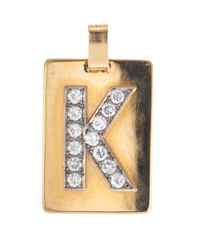 PENDANT, gold with 13 brillinat cut diamonds, app. tot. 0.55 cts. Letter K.