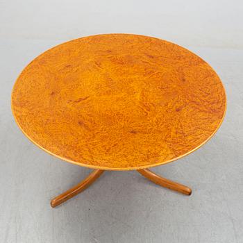 JOSEF FRANK, a model 1028 root veneer and mahogany coffee table from Svenskt Tenn.