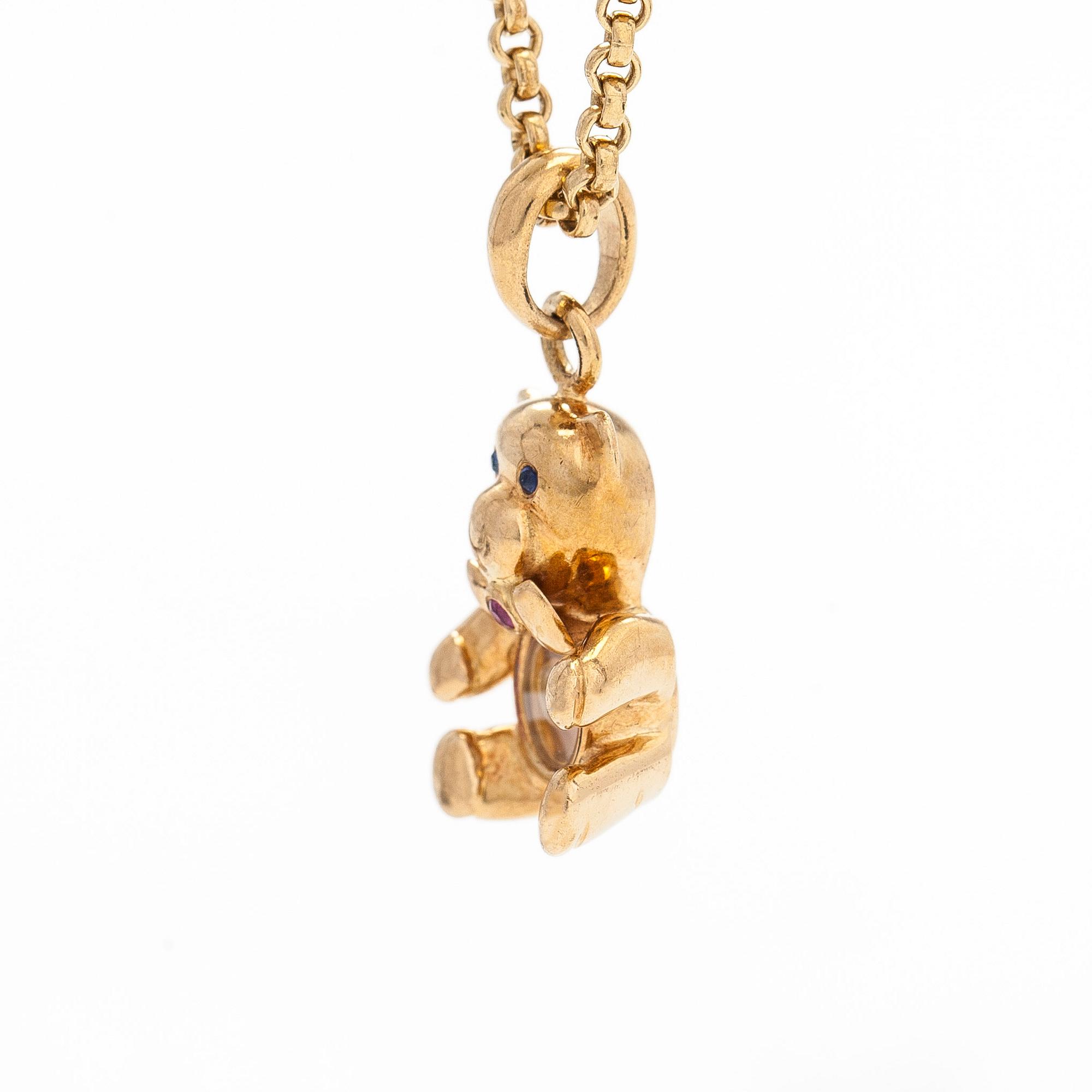 Chopard, an 18K gold 'Happy Diamonds Teddy Bear' pendant necklace.