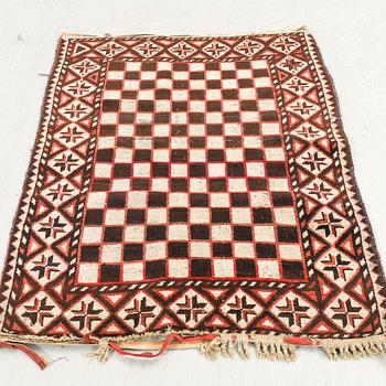 A semaintique/antique beludj carpet ca 115x86 cm.