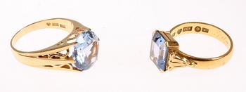 RINGAR, 4 st, 18K guld samt stenar, 1900-talets andra hälft. Tot vikt 25 gram.