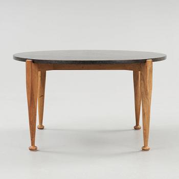 A Josef Frank black marble top table, walnut based, Svenskt Tenn, model 960.