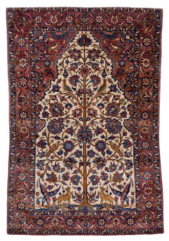 An Antique silk Keshan rug, Central Persia, c. 152 x 105 cm.