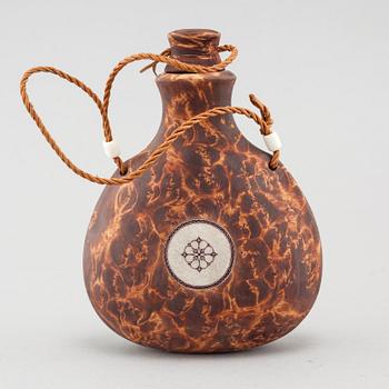 A flask by Roger Saitton, signed RS and dated 2008.