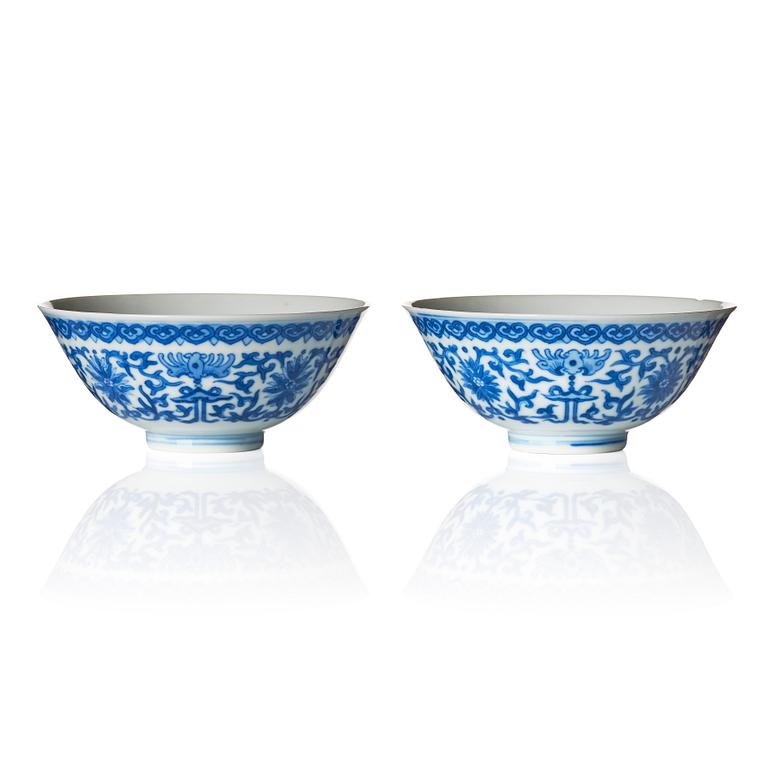 A pair of blue and white lotus bowls, Qing dynasty with Daoguang mark.