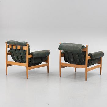 Erik Merthen, a pair of "Amiral" armchairs with ottoman, IRE Möbler, Sweden, 1960's.