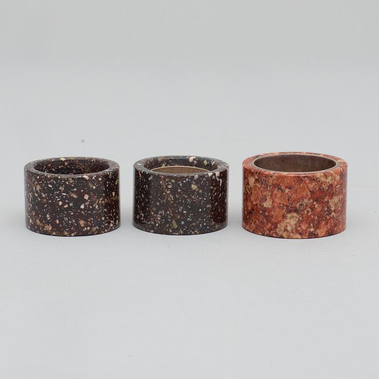 Three Swedish porphyry 20th century napkin rings.