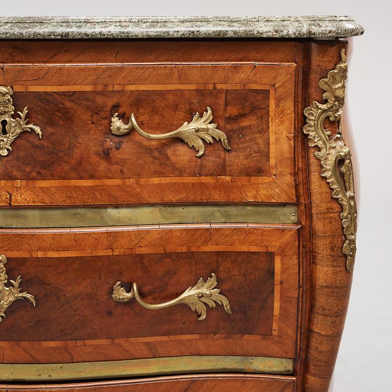 A rococo parquetry and gilt brass-mounted commode by C. Linning (master in Stockholm 1744-79).