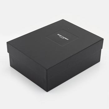 Yves Saint Laurent, a pair of black leather and studs boots, size 38.