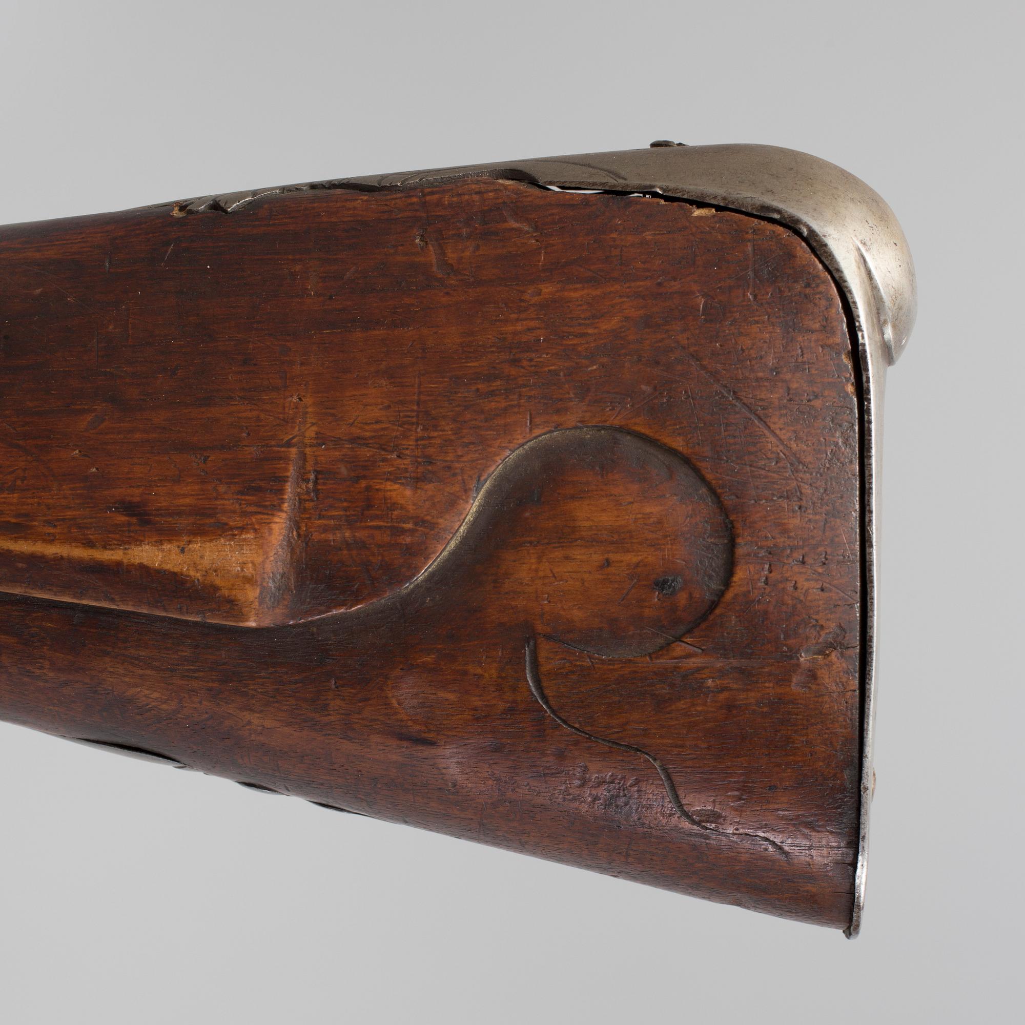 A 18th century flintlock rifle.