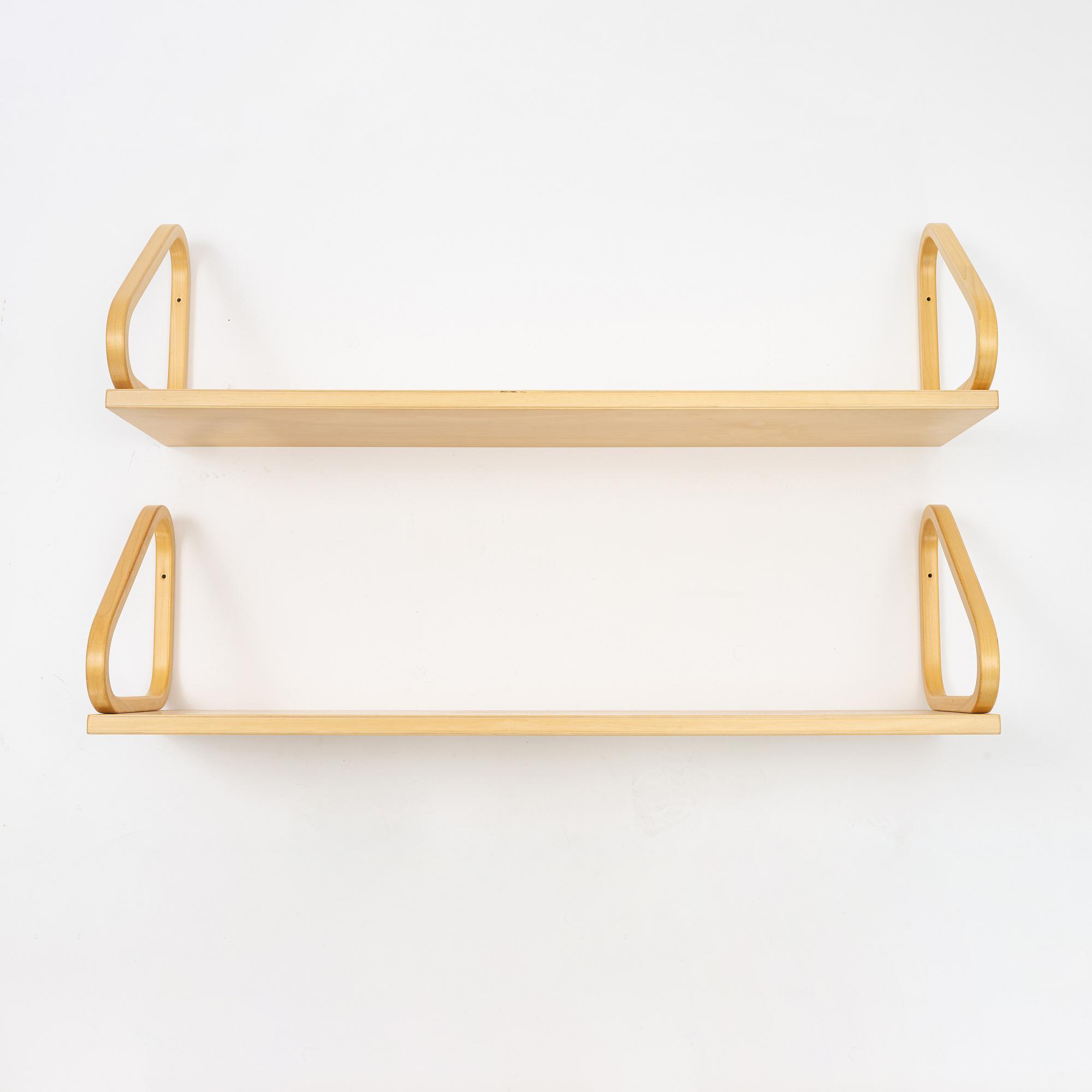 Alvar Aalto, a pair of shelves, Finland, 21st century.