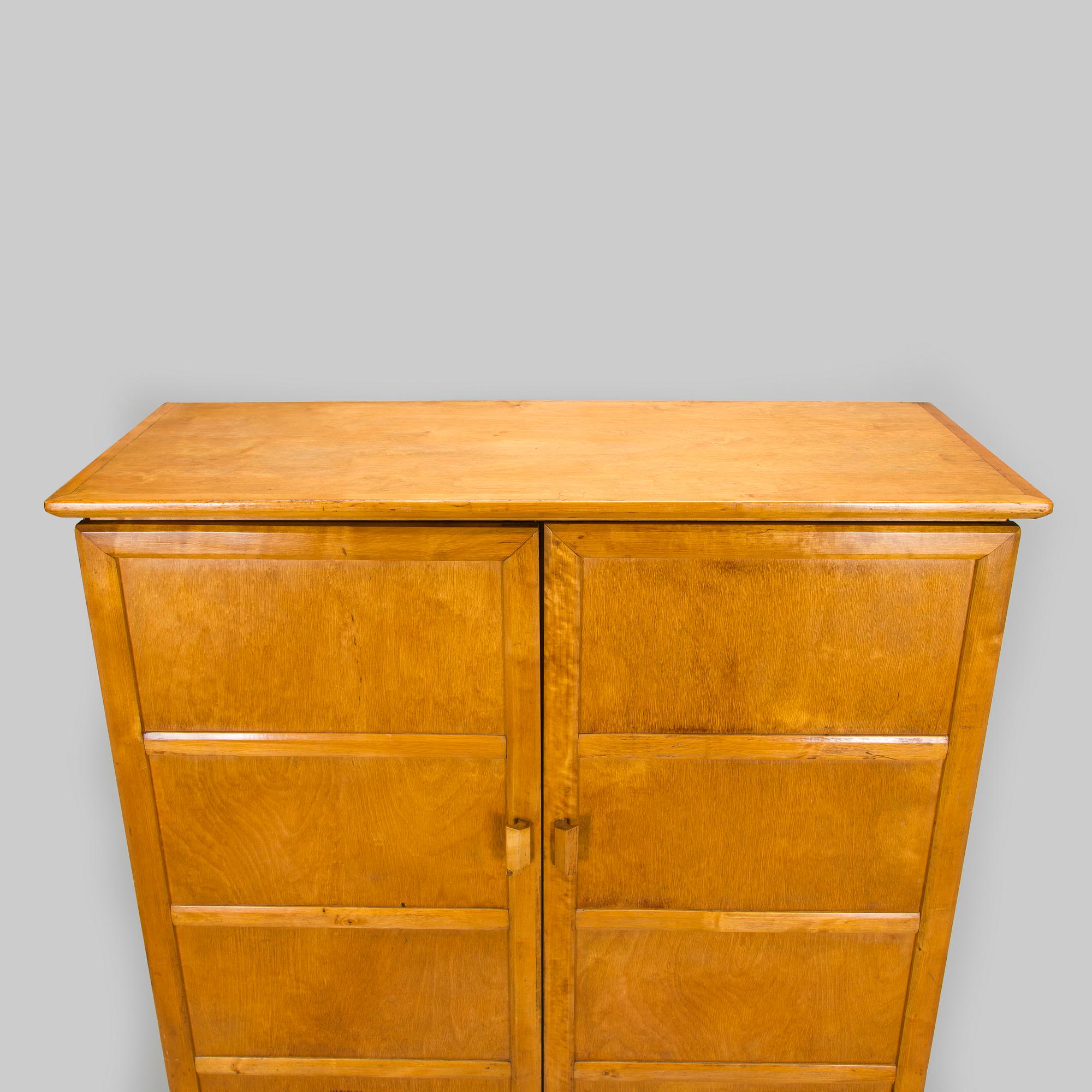 Carl Gustaf Hiort af Ornäs, a mid-1940's cabinet for Hiort Tuote Puunveisto.