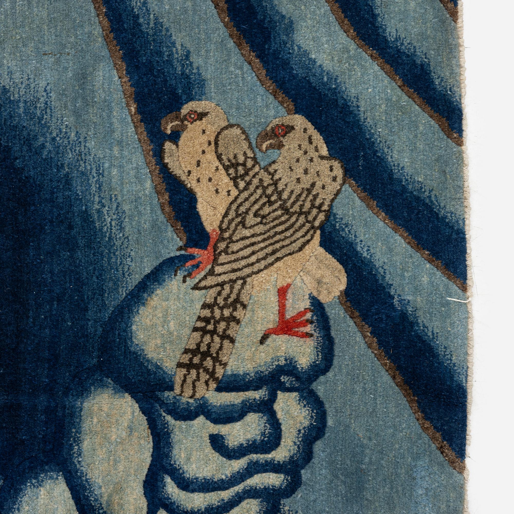 An antique Baotou rug, northern China, late Qing dynasty, around 1900. c. 252x151 cm.