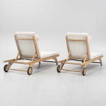 A pair of 'Columbus Sunbed' teak deck chairs, Skagerak, Denmark.