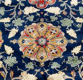 A CARPET so called Royal Kashan, part silk, signed, ca 483 x 311 cm.