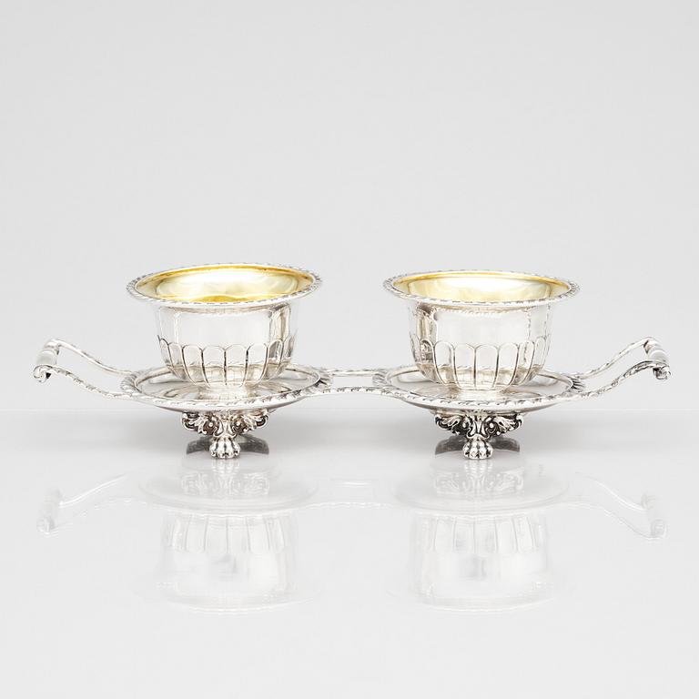 A pair of Swedish candy bowls with stand, parcel-gilt silver, mark of Gustaf Möllenborg, Stockholm 1851.