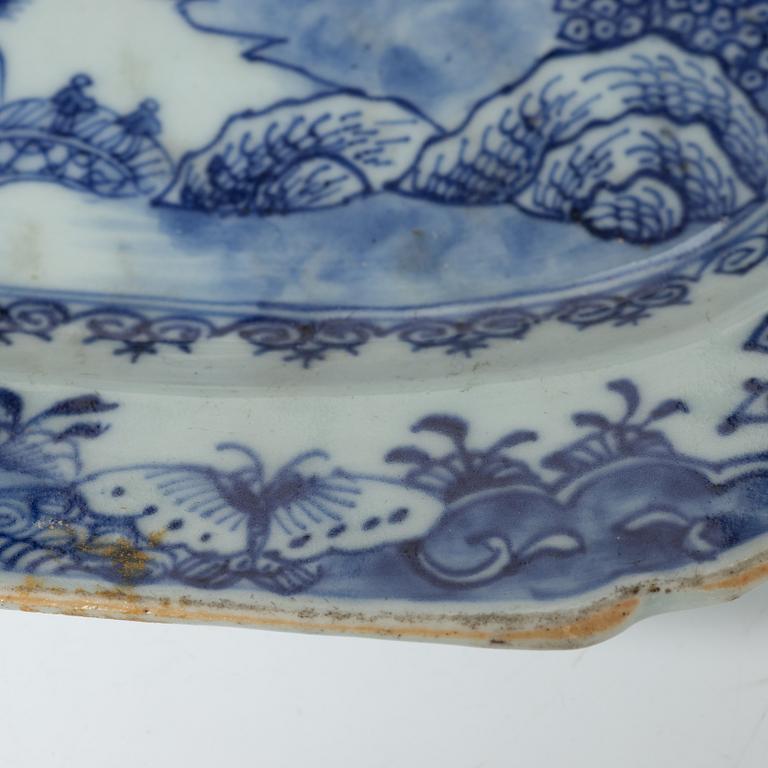 Two Chinese blue and white porcelain dishes and a small dish, Qing dynasty, 18th century.