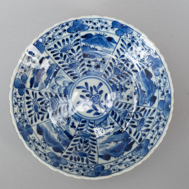 Six Chinese blue and white cups with dishes, early 20th century.
