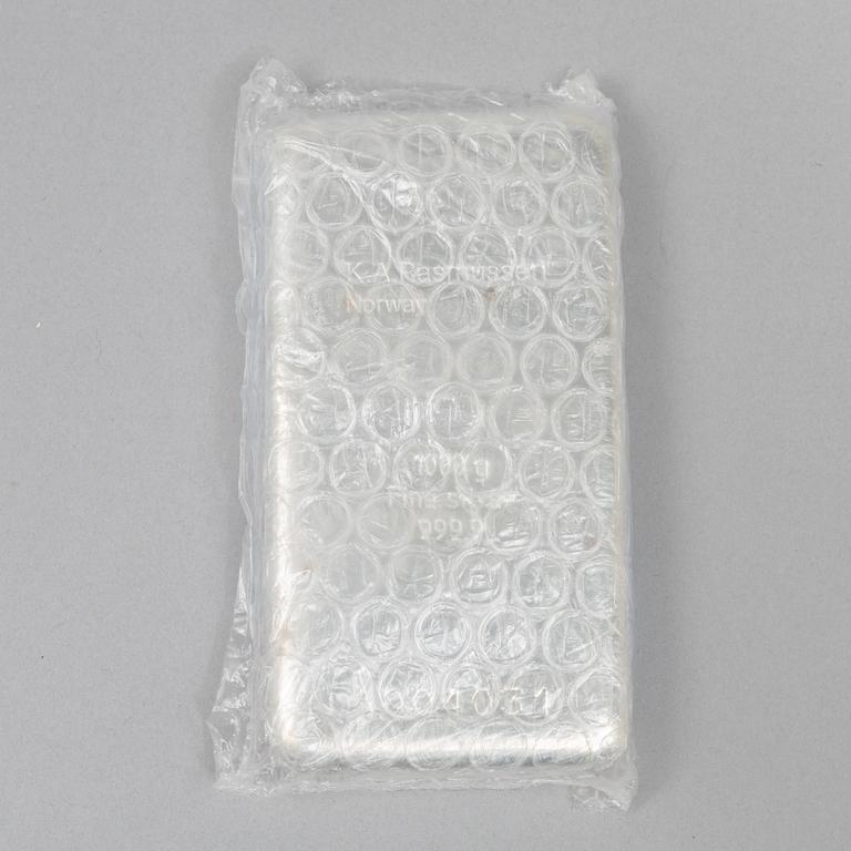 Silvertacka, 1000 gram finsilver, K.A. Rasmussen, Norge.