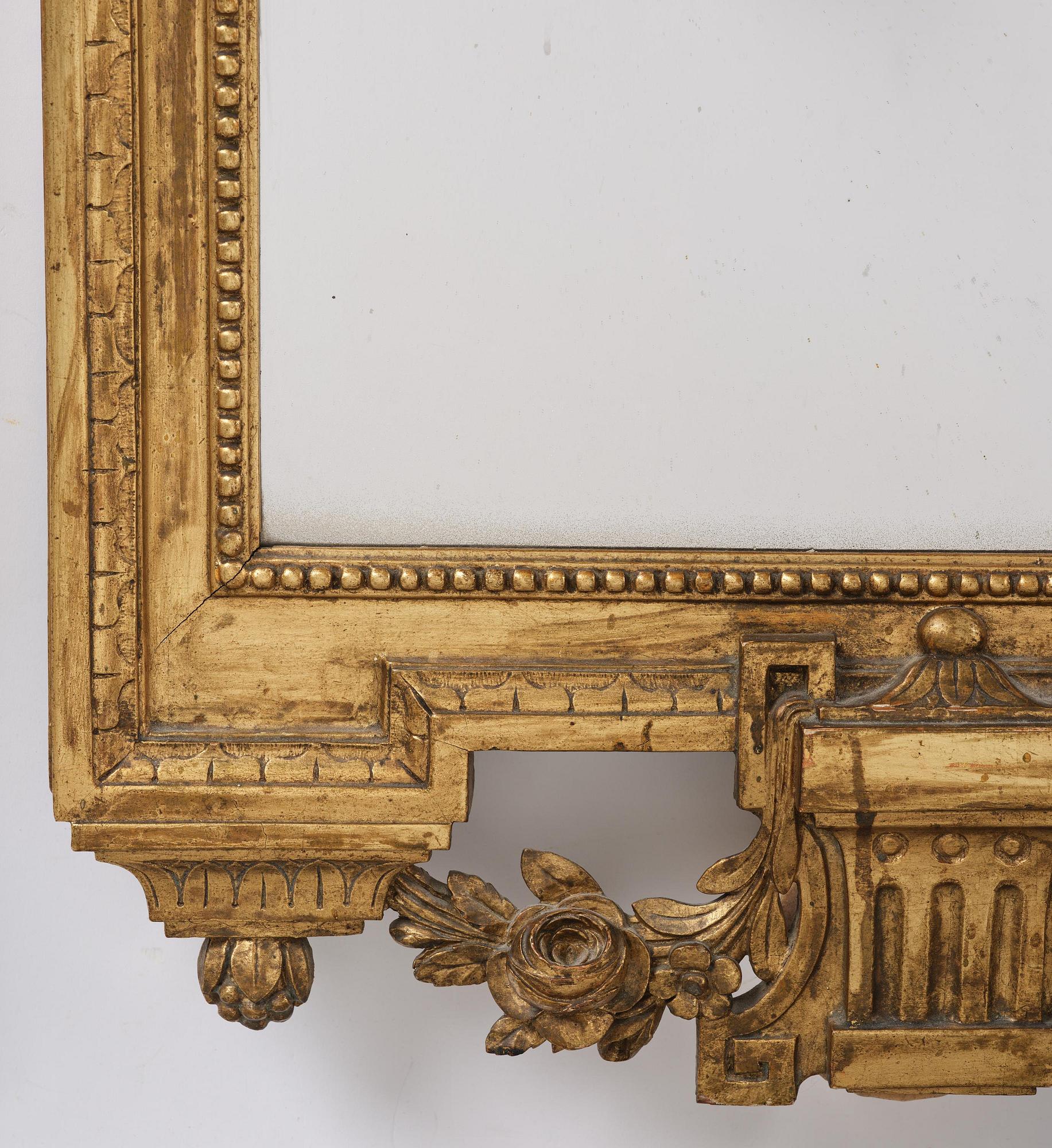 A Gustavian giltwood mirror by J. Åkerblad (master in Stockholm 1758-99).