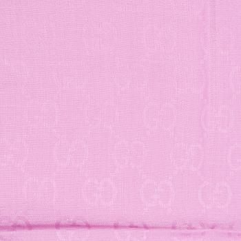 Gucci, a wool and silk mix "GG" jaquard shawl.