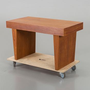 A Scandinavian 1960s-70s teak table.