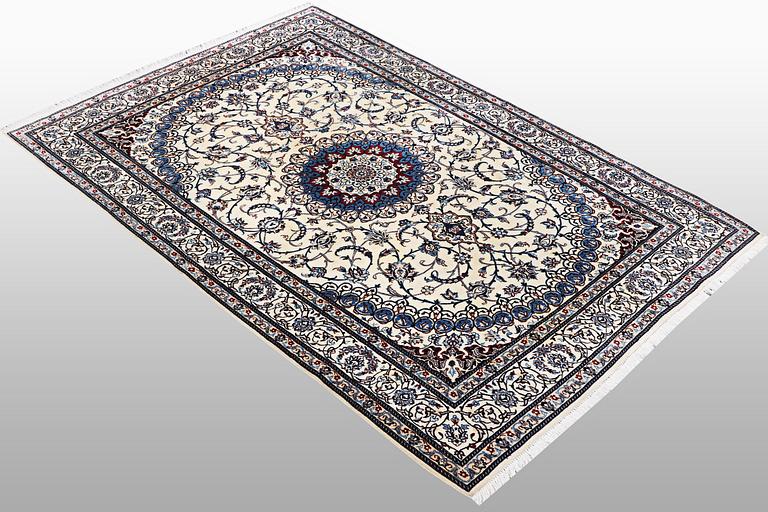 A rug, Nain, Part Silk, sk 6 LAA, ca 204 x 137 cm.