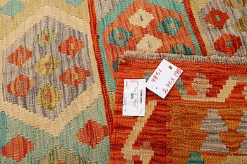A Kilim carpet, c. 290 x 198 cm.