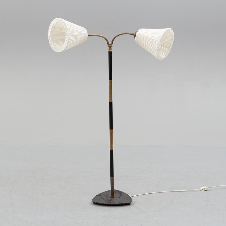 a mid 20th century floor lamp.