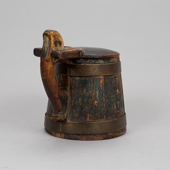 A swedish folk art wood tankard.