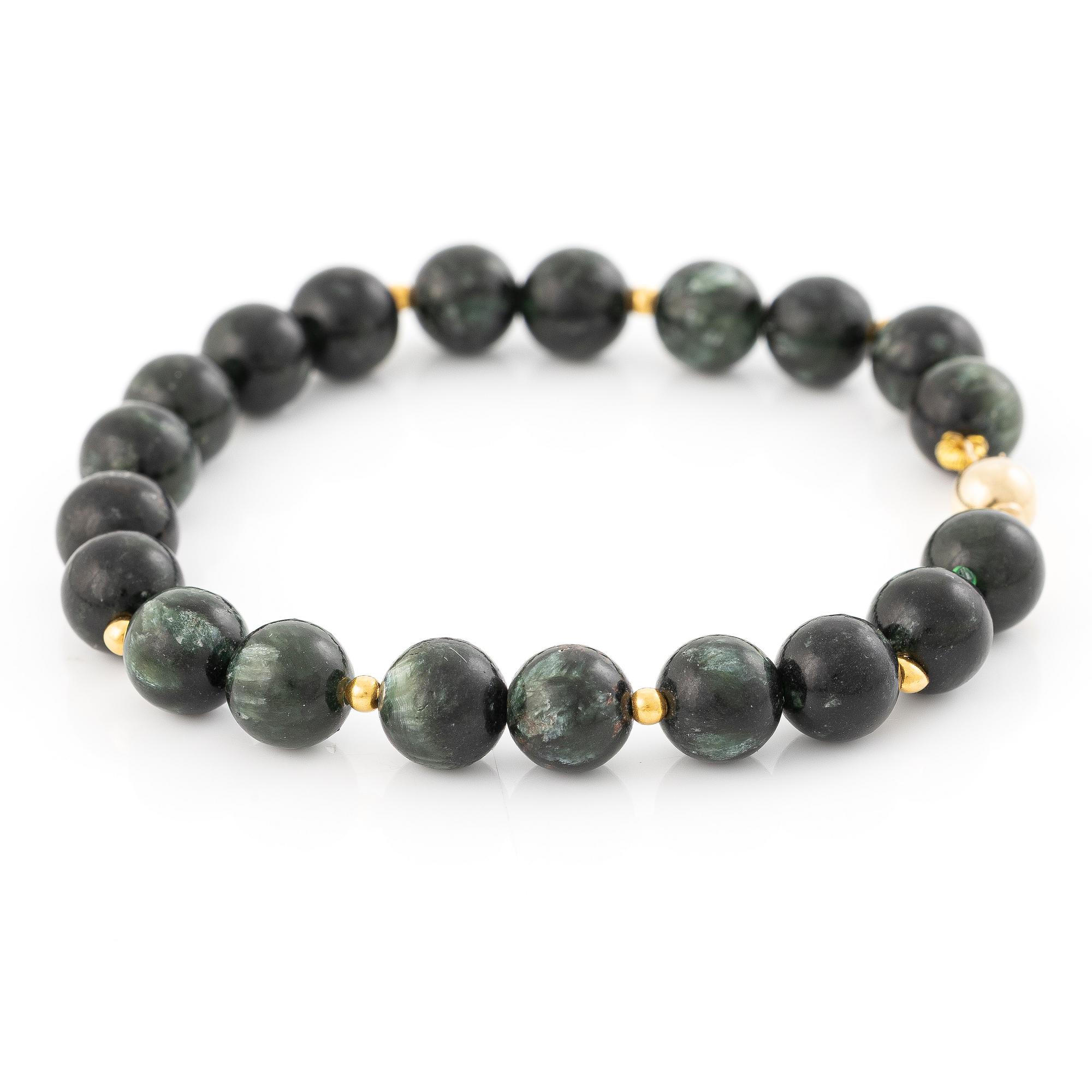 Bracelet, with dark green stones, clasp in 18K gold.