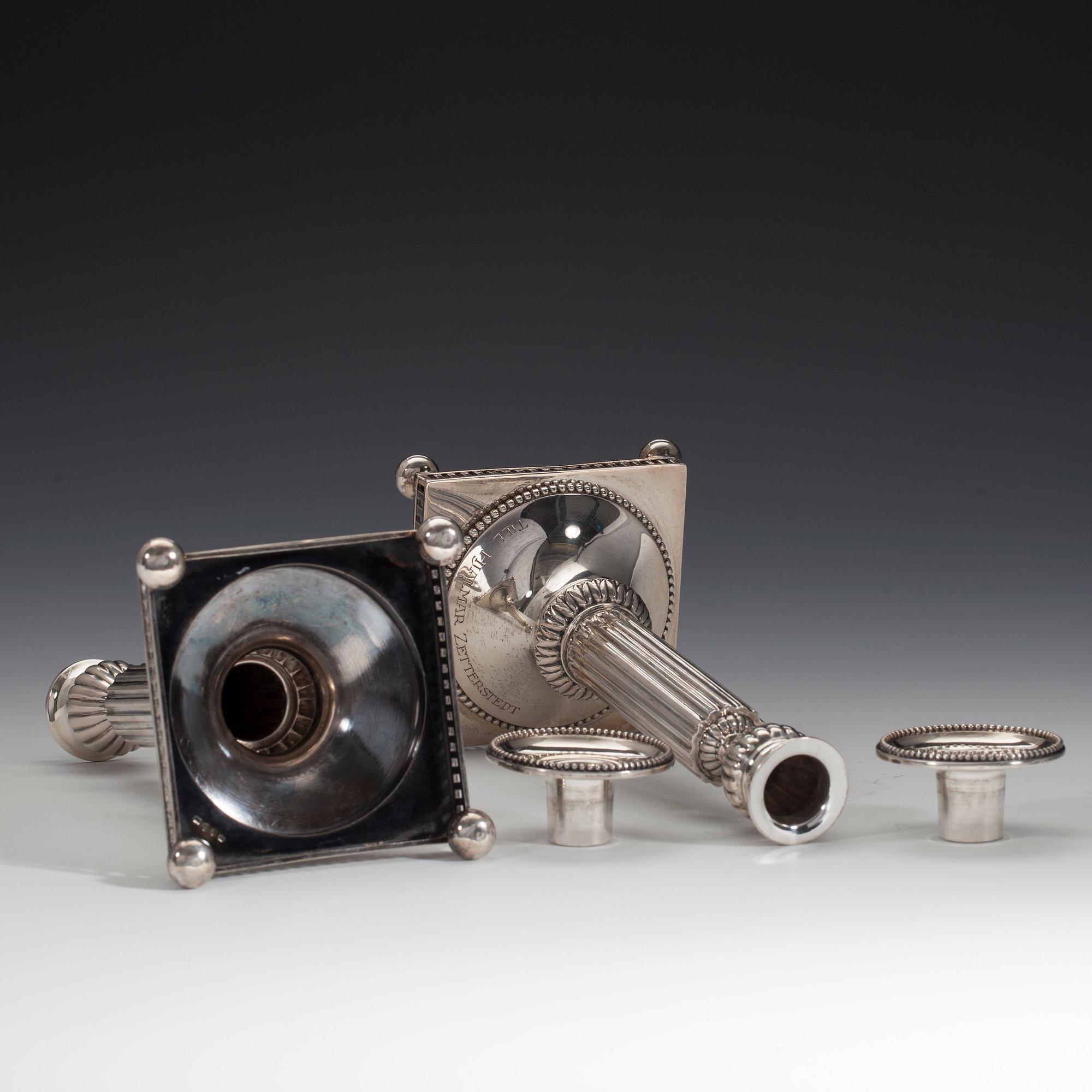 LJUSSTAKAR, ett par. Silver GAB Stockholm 1911. Höjd 20,5 cm. Vikt 428 g.