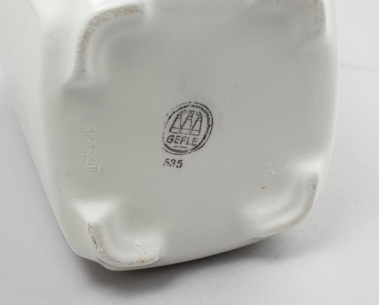 A set of earthenware kitchen jars from Gefle, first half of the 20th century.