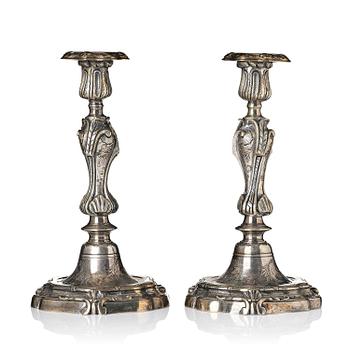 164. A pair of  Louis XV mid 18th century silvered brass candlesticks.