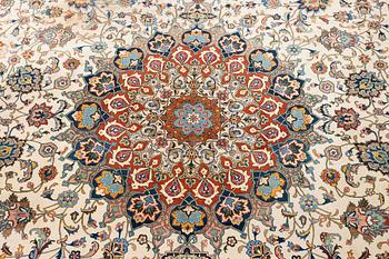 A carpet, semi-antique Tabriz, ca 379 x 280 cm.