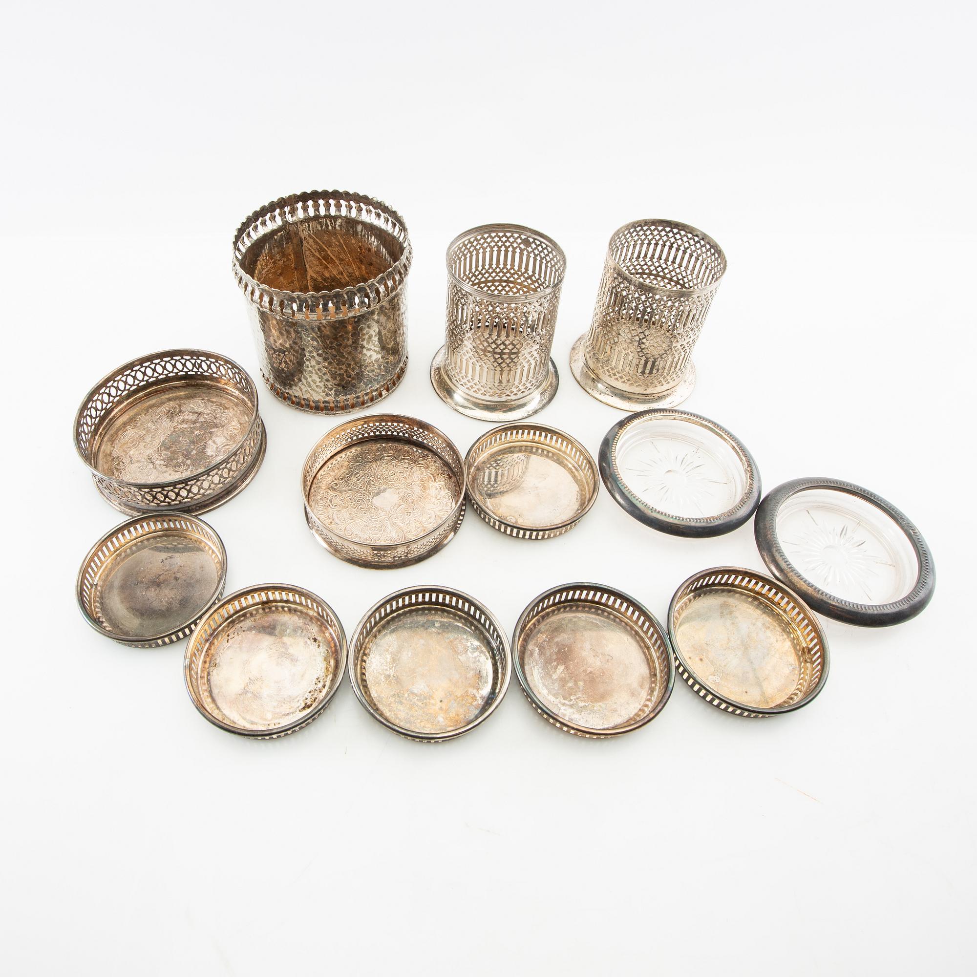 Coasters/Bottle holders 13 pcs first half of the 20th century, silver plate.