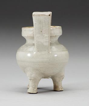 A pale grey-bluish glazed tripod censer with decor in relief, and archaistic mark, Ming dynasty (1368-1644).