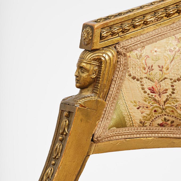 A pair of late Gustavian open armchairs attributed to E. Ståhl (master in Stockholm 1794-1820).