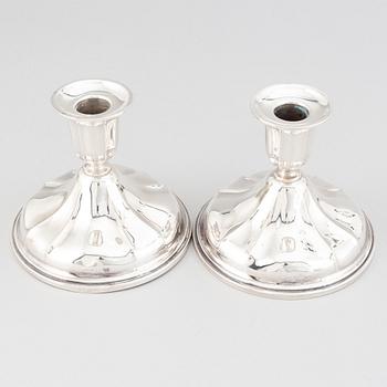 A pair of Norwegian silver candle sticks, mid 20th century.