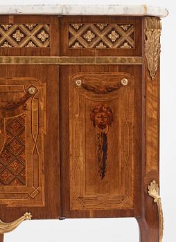 A pair of Gustavian marquetry, ormolu-mounted, and marble encoignures by G. Iwersson (master in Stockholm 1778-1813).