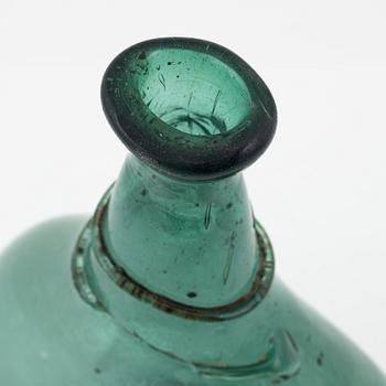 A green glass bottle, 18th/19th Century.