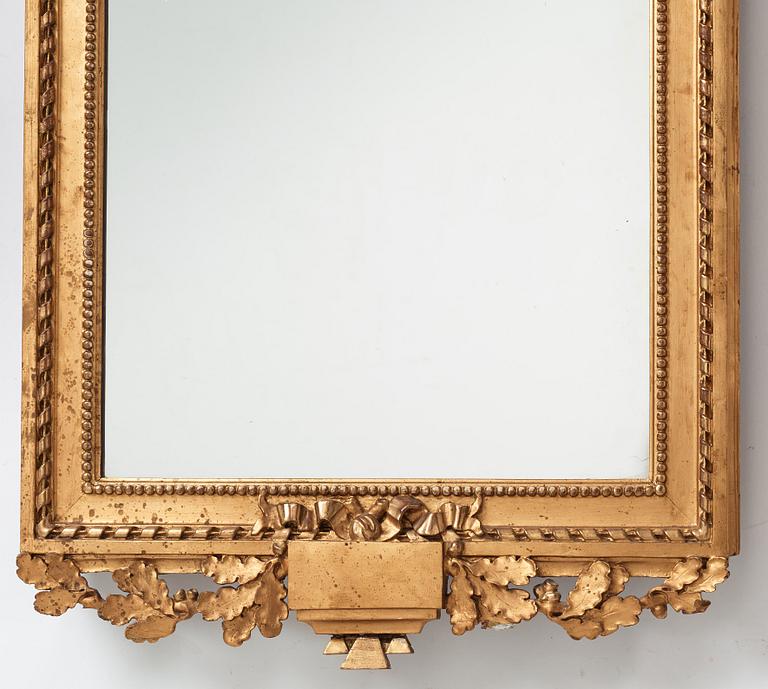 A Gustavian mirror, late 18th century.