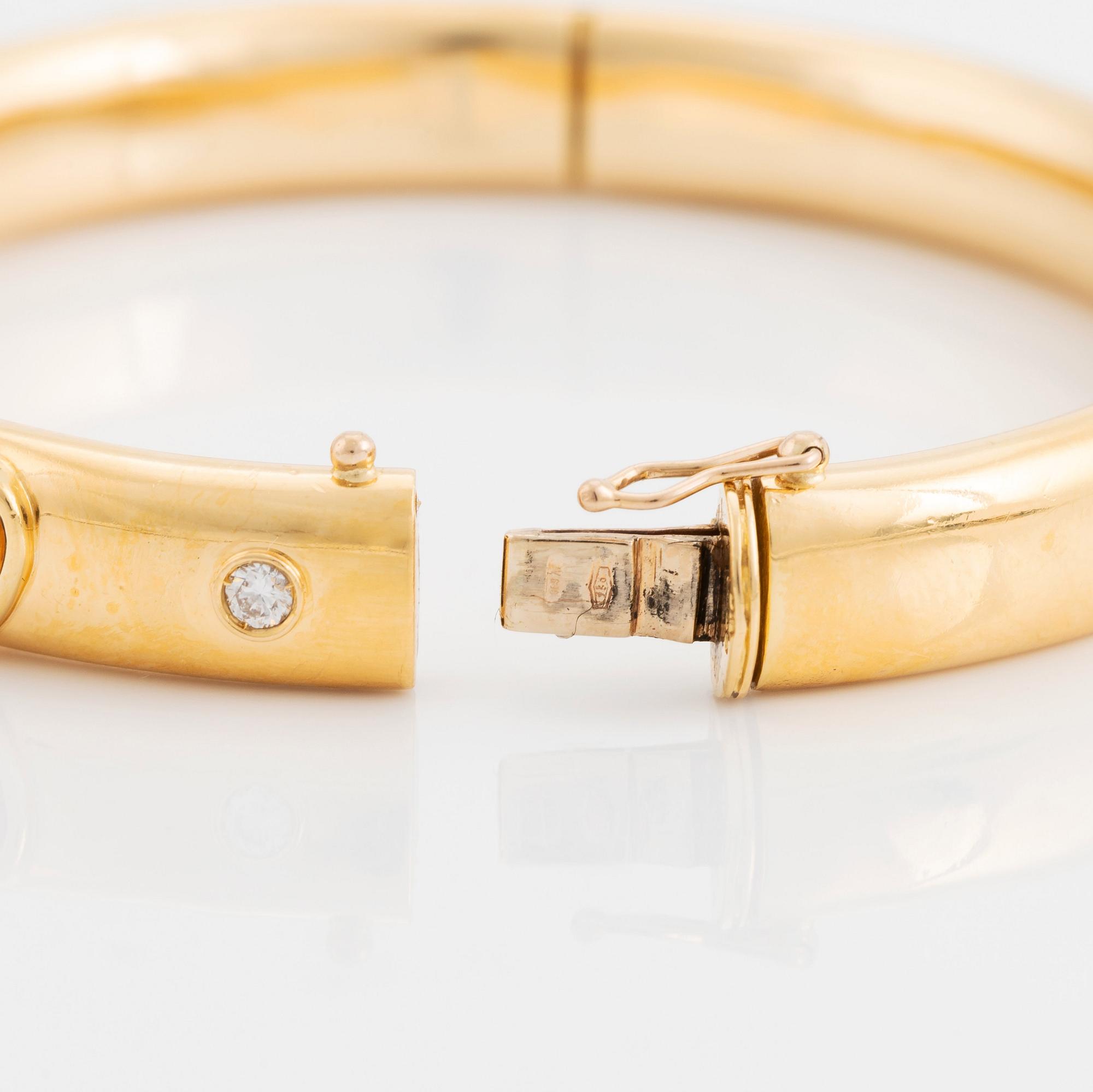 Armring 18K guld med hjärtformade citriner och runda briljantslipade diamanter, David Morris.