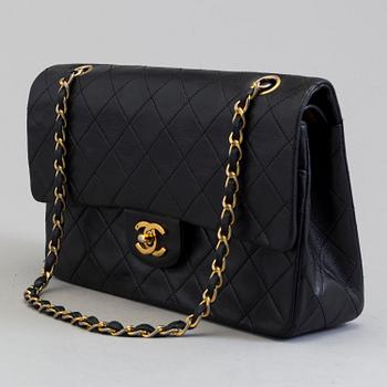 CHANEL, a black leather shoulder bag, "Double Flap".