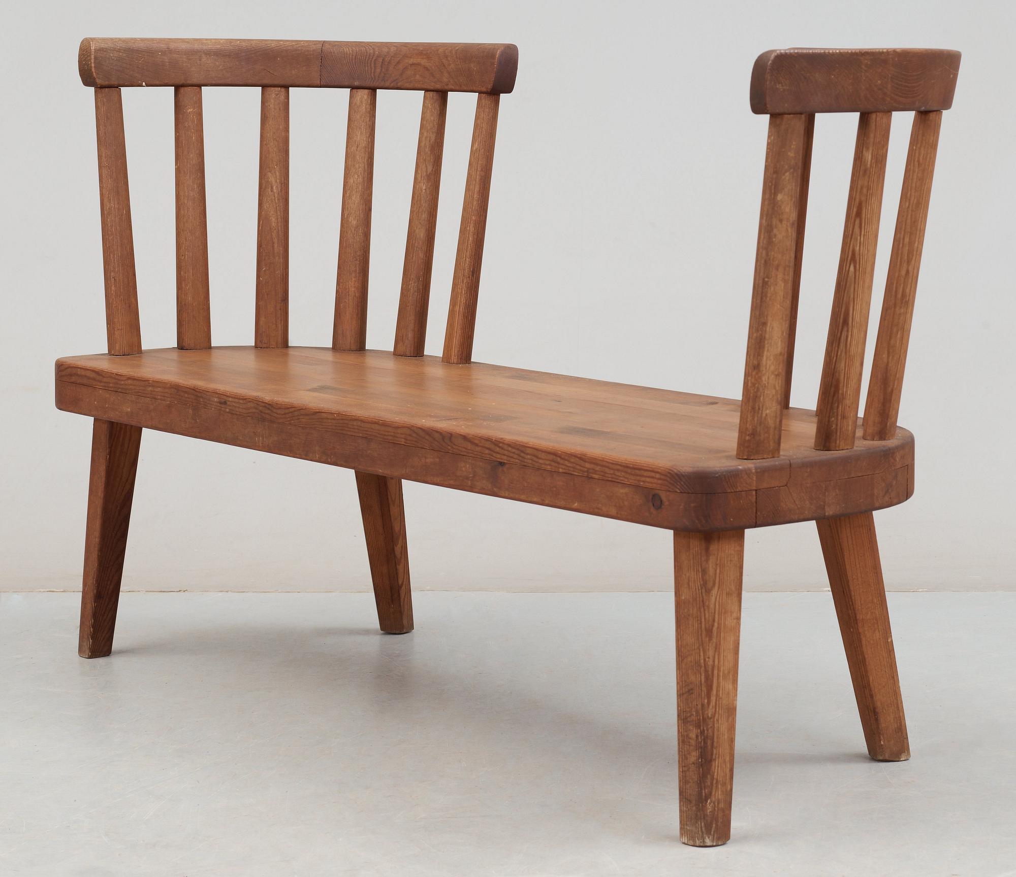 An Axel Einar Hjorth stained pine 'Utö' sofa, Nordiska Kompaniet, 1930's.