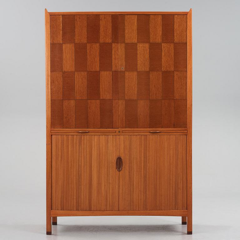 David Rosén, a mahogany and teak cabinet, for Stockholm's Association of Crafts, signed and dated 1959.