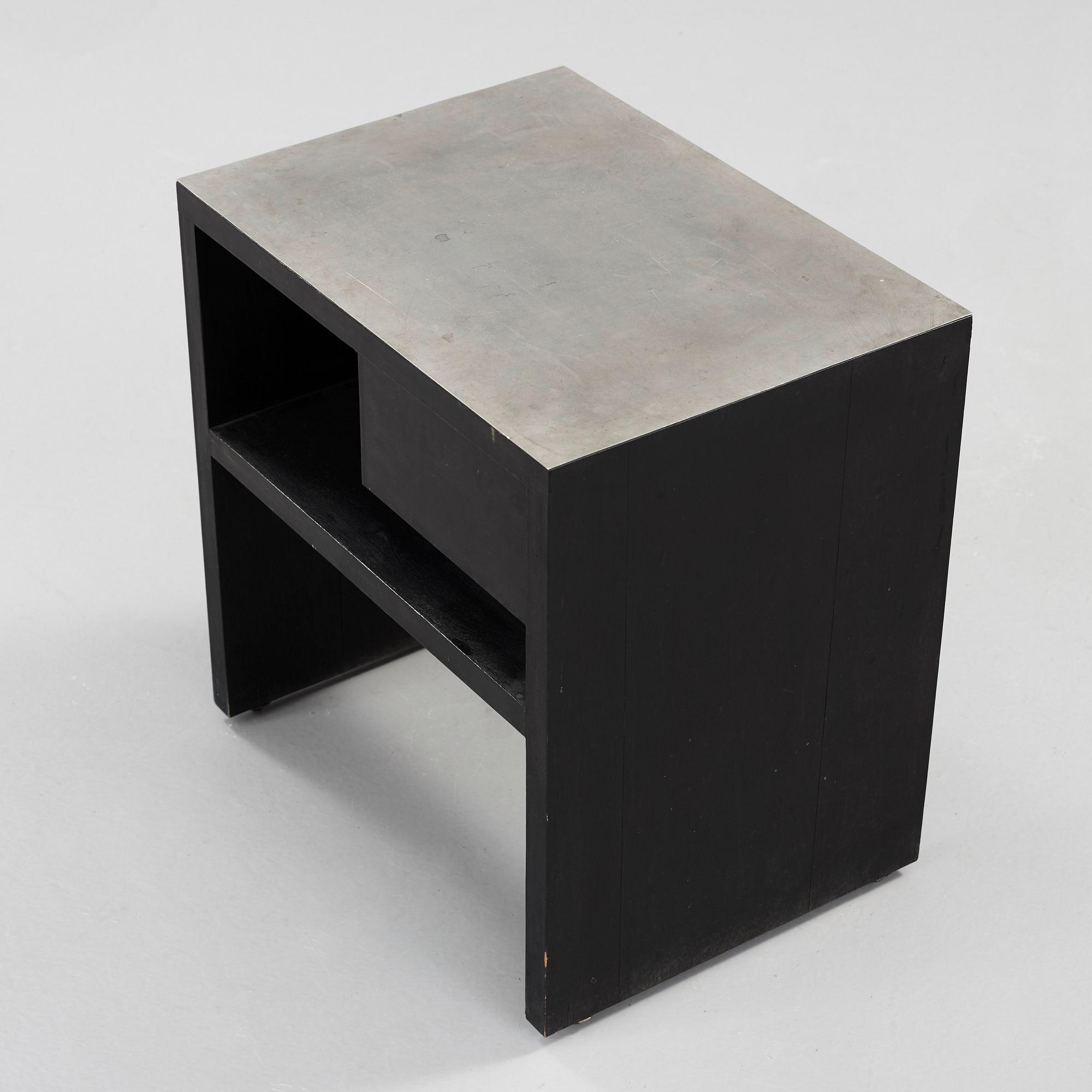 An Uno Åhrén black lacquered birch and pewter side table, Svenskt Tenn, Stockholm ca 1930.