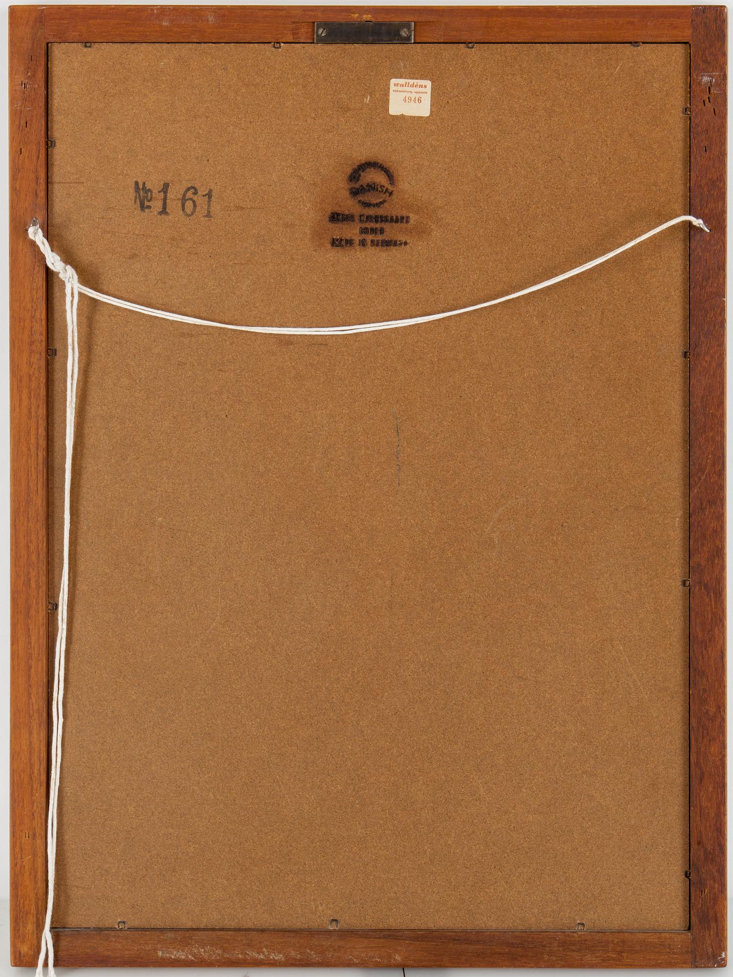 A teak mirror by Aksel Kjersgaard, Odder, Denmark.