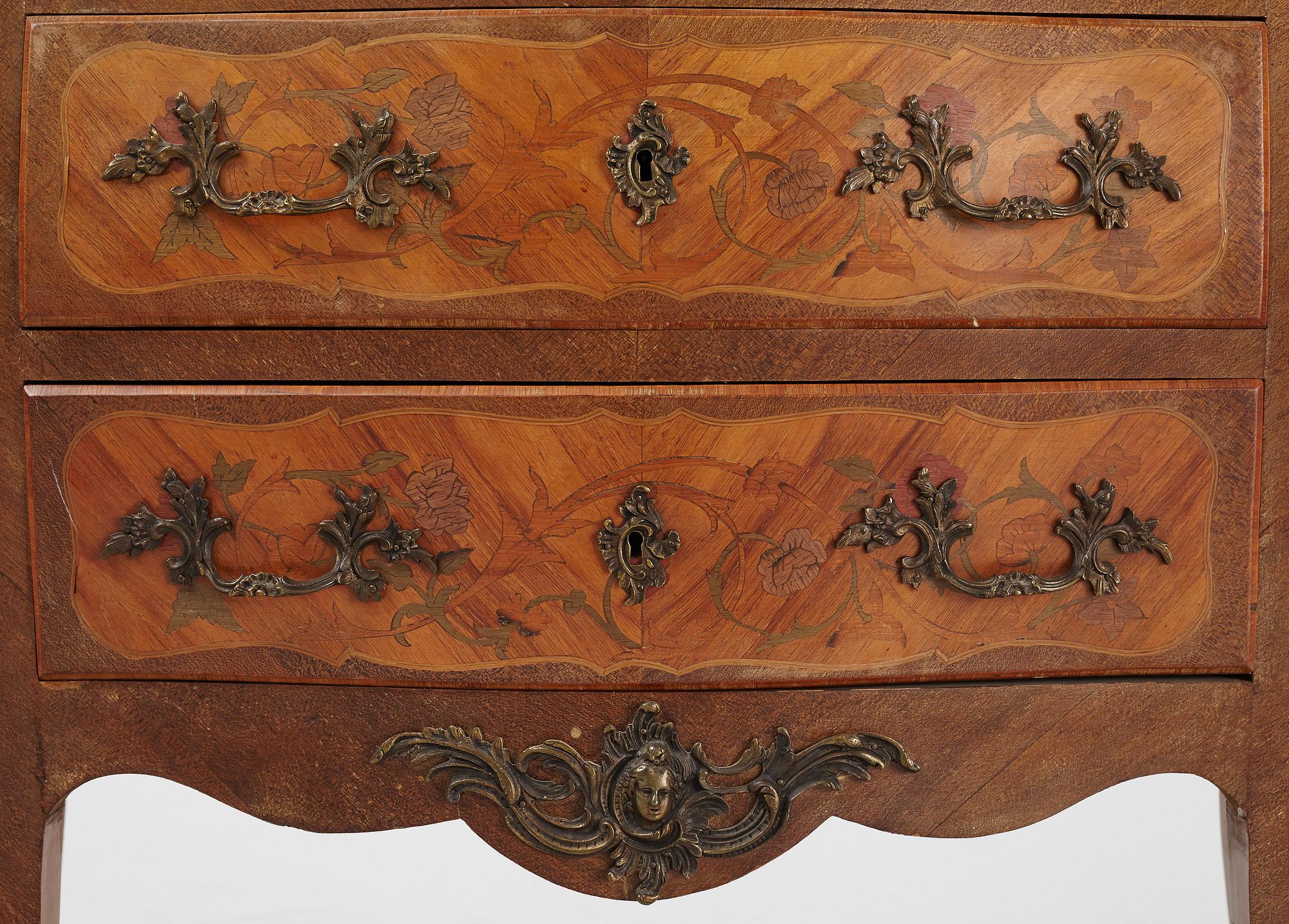 A Louis XV-style marquetry commode, first part of the 20th century.